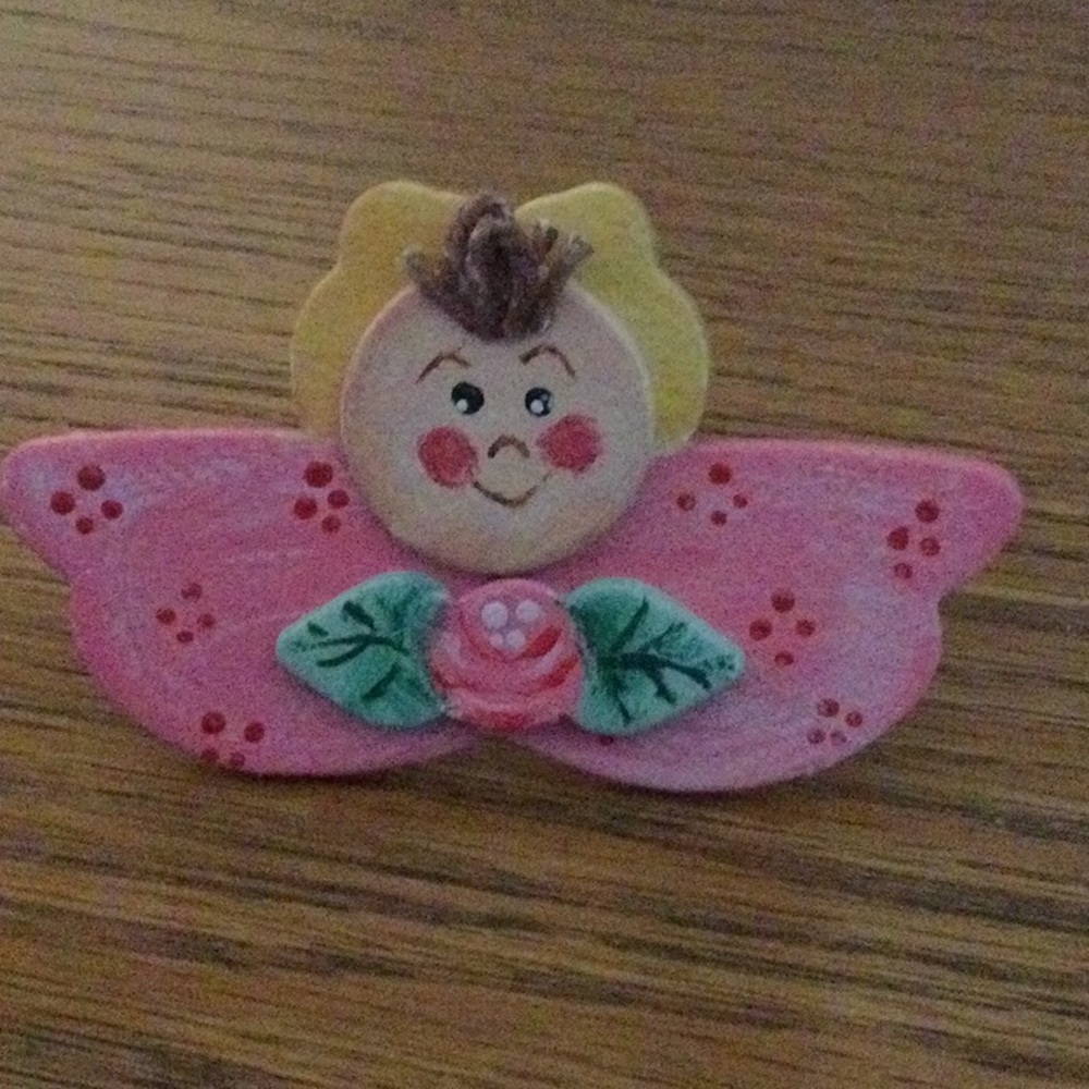 2 piece little girl wooden pin set.